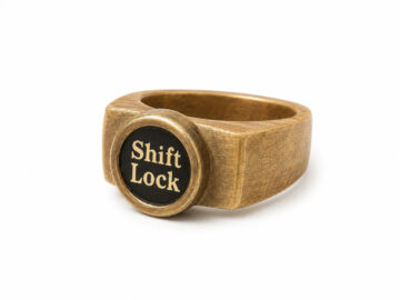 انگشتر نقره و چوب آبنوس طرح قاب گرد (دکمه Shift Lock)